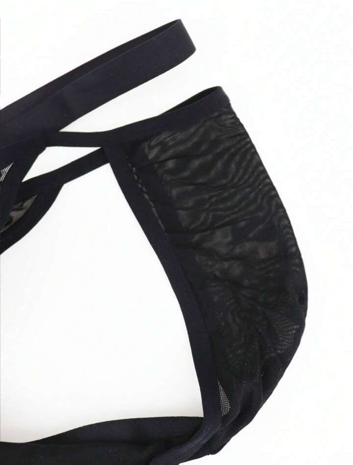 Sheer mesh cage brief in black